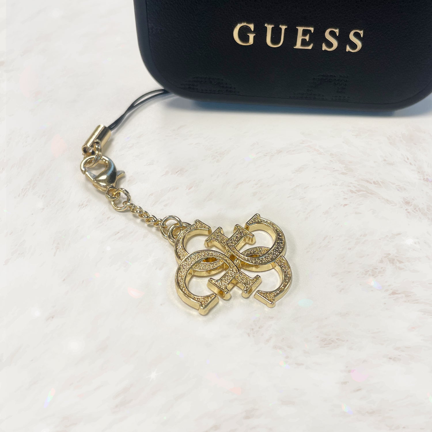 Guess case hanger GUCPM4DRD Phone Strap 4G Glitter Charm